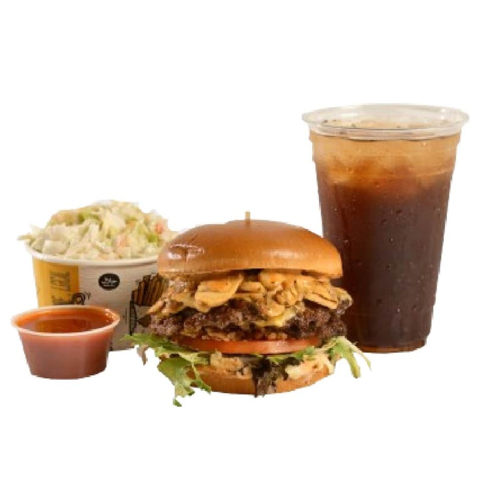 A Peri Peri Original fast-food meal with a burger, coleslaw, dipping sauce, and a drink.